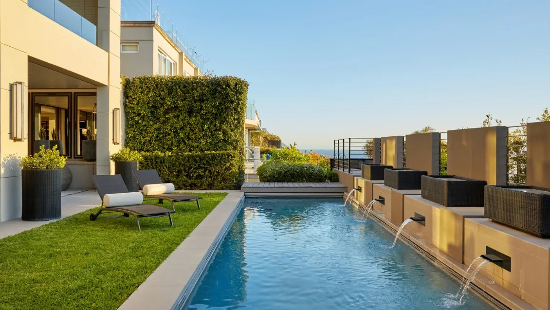 Swimming pool and garden area at Halcyon
